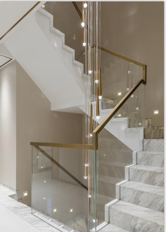 Volakas White Marble Steps White Glass and Gold Handrail Volakas White Marble Steps White Glass and Gold Handrail