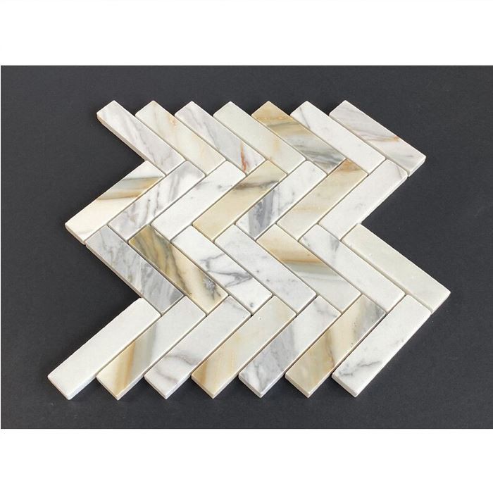Calcatta gold marble herringbone mosaic tile