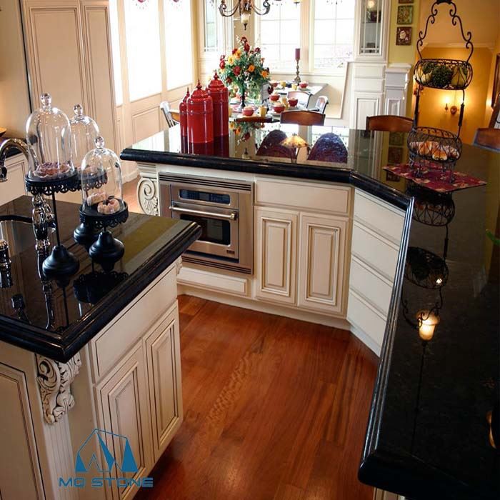 cabinets white with black granite countertops