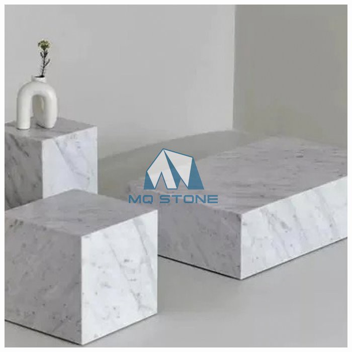 Carrara marble plinth coffee table