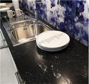 Modern Kitchen With Black Granite Countertops